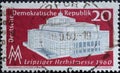 GERMANY, DDR - CIRCA 1960 : a postage stamp from Germany, GDR showing the newly built Leipzig Opera House, trade fair sign `MM`