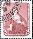 GERMANY, DDR - CIRCA 1957 : a postage stamp from Germany, GDR showing the painting `Saskia with the red flower` by Rembrandt. Pa