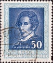 GERMANY, DDR - CIRCA 1952 : a postage stamp from Germany, GDR showing a portrait of the composer Carl Maria von Weber. To the Hand
