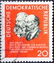 GERMANY, DDR - CIRCA 1965 : a postage stamp from Germany, GDR showing a portrait of Karl Marx and W. I. Lenin. Conference of Mini