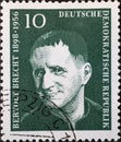 GERMANY, DDR - CIRCA 1957 : a postage stamp from Germany, GDR showing a portrait of the playwright and poet Bertolt Brecht. green Royalty Free Stock Photo