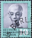 GERMANY, DDR - CIRCA 1959 : a postage stamp from Germany, GDR showing a princess head from Tell-el-Amarna around 1360 B.C.. anti