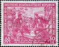 GERMANY, DDR - CIRCA 1950: a postage stamp from Germany, GDR showing a sales booth in the municipal department store for the first