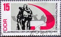 GERMANY, DDR - CIRCA 1967: a postage stamp from Germany, GDR showing a sculpture. Text: 50th anniversary of the great socialist Oc