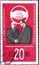 GERMANY, DDR - CIRCA 1966  : a postage stamp from Germany, GDR showing the symbolic handshake between Wilhelm Pieck KPD and Otto Royalty Free Stock Photo