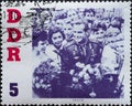GERMANY, DDR - CIRCA 1961 : a postage stamp from Germany, GDR showing Titov and Young Pioneers. Visit of the Soviet cosmonaut Germ