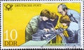 GERMANY, DDR - CIRCA 1981 : a postage stamp from Germany, GDR showing the Training of apprentices at the German post office. Text: Royalty Free Stock Photo