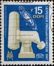 GERMANY, DDR - CIRCA 1967 : a postage stamp from Germany, GDR showing a universal mirror telescope, Milky Way, VEB Carl Zeiss Jena