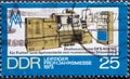 GERMANY, DDR - CIRCA 1973 : a postage stamp from Germany, GDR showing a Lathe with numerical control Text: Leipziger spring fair 1
