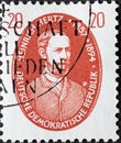 GERMANY, DDR - CIRCA 1957 : a postage stamp from Germany, GDR showing a portrait of physicist Heinrich Hertz in a red oval. Famous