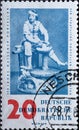 GERMANY, DDR - CIRCA 1960 : a postage stamp from Germany, GDR showing a potter at the potter`s wheel based on a design: Johann J