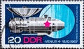 GERMANY, DDR - CIRCA 1968: a postage stamp from Germany, GDR showing a spaceship of the USSR Venus 4. Text: First soft landing of