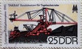 GERMANY, DDR - CIRCA 1981 : a postage stamp from Germany, GDR showing a TAKRAF, belt stacker for opencast lignite mining operation