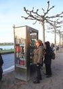 Street Library - Woman Taking A Book