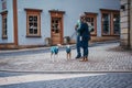 Germany, Erfurt, 21.11.2021.Dog breeders socialize on the street of the old town Royalty Free Stock Photo