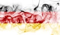 Germany flag smoke isolated on a white background. Royalty Free Stock Photo