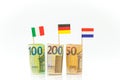 Germany, France Italy Flags and bills on a white background.euro money inflation.Inflation and economic recession in Royalty Free Stock Photo