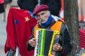 GERMANY, FRANKFURT: 12 DECEMBER 2016 - European street musicians who sitting on the pedestrian streets and playing music Royalty Free Stock Photo