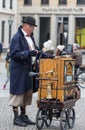 GERMANY, FRANKFURT: 12 DECEMBER 2016 - European street musicians who sitting on the pedestrian streets and playing music Royalty Free Stock Photo