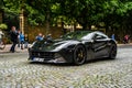 GERMANY, FULDA - JUL 2019: dark gray FERRARI F12 BERLINETTA coupe also unofficially referred to as the F12 Berlinetta or the F12,