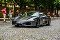 GERMANY, FULDA - JUL 2019: dark gray FERRARI F430 Type F131 cabrio is a sports car produced by the Italian automobile manufacturer