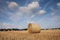 Germany, harvested field and straw bales