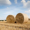 Germany, harvested field and straw bales