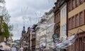 Germany Heidelberg city. View of old building cloudy sky through giant soap bubble. Under view
