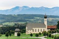 Germany, Munich - September 02, 2013. Scenic mountain landscape in the Bavarian Alps with famous Parish Church of St. Sebastian in