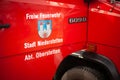 Germany, Niederstetten. September 2019. Door of firefighters truck with text Freiw. Feuerwehr Stadt Niederstetten Abt. Oberstetten