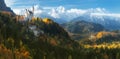 Germany. Panorama. The famous Neuschwanstein Castle and Hohenschwangau Castle on the background of snowy mountains.