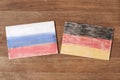 Germany and Russia flag, concept cooperation friendship on wood background Royalty Free Stock Photo