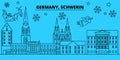 Germany, Schwerin winter holidays skyline. Merry Christmas, Happy New Year decorated banner with Santa Claus.Germany
