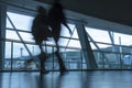 Germany, Stuttgart, 19 January 2015: People Leaving an Office Building, Motion Blur Royalty Free Stock Photo