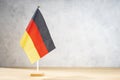 Germany table flag on white textured wall