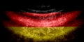 Germany wavy flag in grunge style with darkened edges. Aged texture Royalty Free Stock Photo
