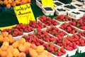 Natural strawberries in boxes at a farmers market