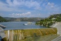 Germasogeia dam on a spring day when the resevoir is full and overflowing over the sluice gate