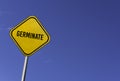 germinate - yellow sign with blue sky background