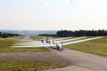 Gliders sailplanes ready for takeoff on Wasserkuppe airfield in RhÃ¶n Mountains.