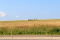 People moving a glider sailplane on Wasserkuppe airfield in Rhoen Mountains