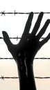 Gesture of need Hand silhouette silently asks for assistance Royalty Free Stock Photo