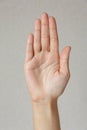 Gesture and sign, hand showing stop on a light background Royalty Free Stock Photo