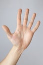 Gesture and sign, hand showing stop on a light background Royalty Free Stock Photo