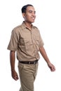 Gesture of young man in uniform walking isolated Royalty Free Stock Photo