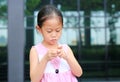 The gestures of children who lack confidence. Child girl intend her fingers