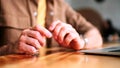 The gestures of a man next to a laptop