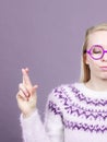 Teenage blonde woman making promise gesture Royalty Free Stock Photo