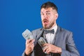 Get cash easy and quickly. Cash transaction business. Easy cash loans. Man formal suit hold pile of dollar banknotes Royalty Free Stock Photo