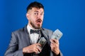 Get cash easy and quickly. Cash transaction business. Easy cash loans. Man formal suit hold pile of dollar banknotes Royalty Free Stock Photo